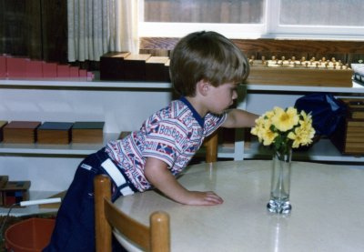 A child cleaning at the end of the individual work time in my Montessori school in 1981.