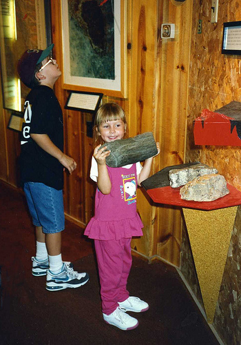 A study of geology included a visit to the Petrified Forest of the Black Hills. Will (9) and Christina (4), 1994.