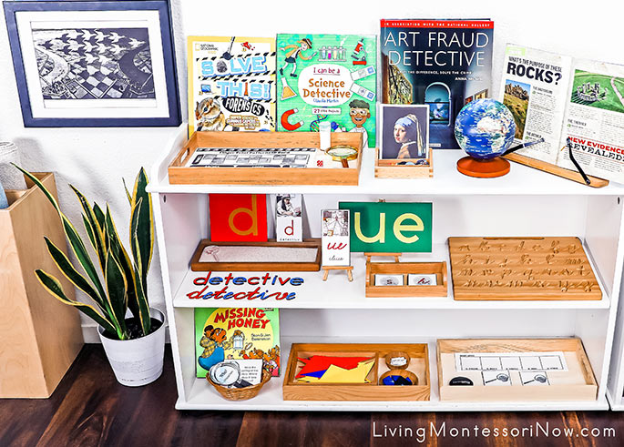 Montessori Shelves with Detective-Themed Activities and Photo of MC Escher Artwork