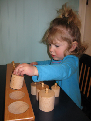 Using a Cylinder Block (Photo from Discovery Days and Montessori Moments)